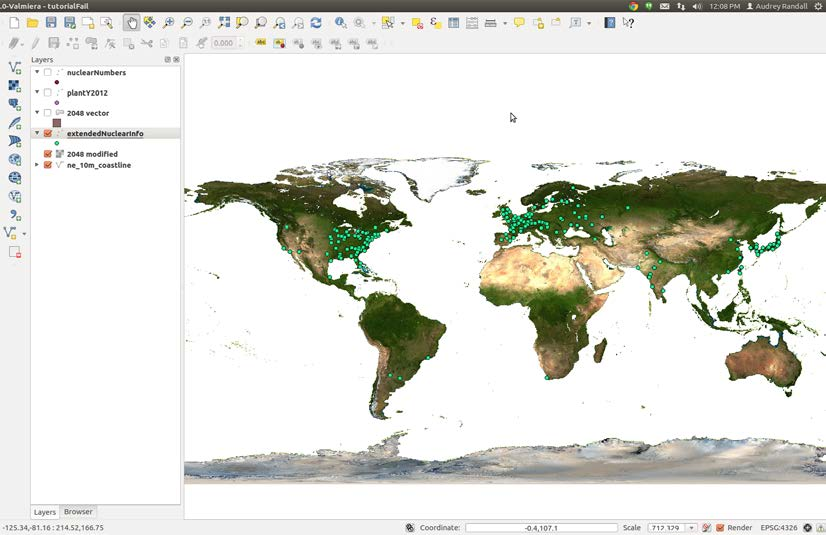 QGIS displays small green dots at the sites of nuclear reactors around the world overlaid on a basemap showing vegetation levels on earth