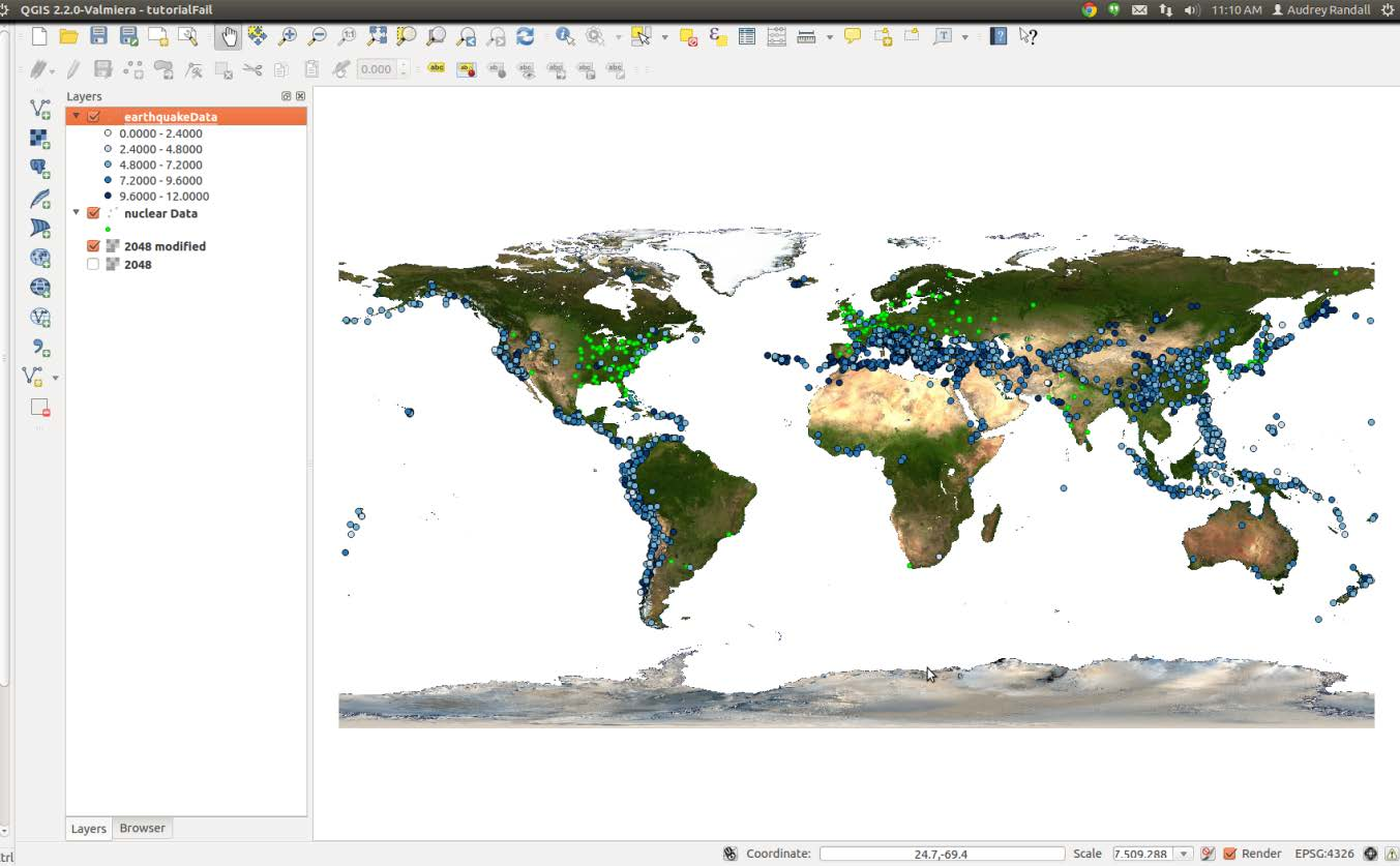 A map of Earth showing small green circles for nuclear reactors and smale blue circles for earthquakes that are shaded from light blue to dark blue