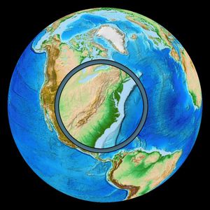 A globe oriented towards North America. A circle drawn over the globe contains an enlarged image of the north eastern coast of North America